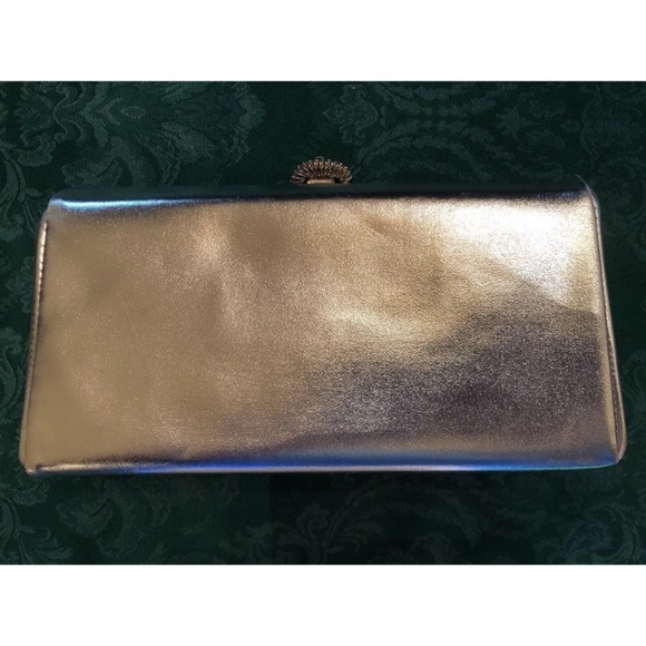 Chic Black Wristlet with Sleek Design and Metallic Accents - Picture 7 of 16